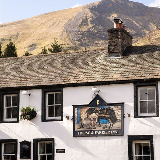 Horse & Farrier, Threlkeld: pub exterior with hill behind