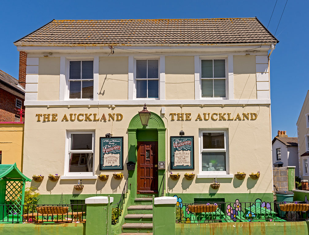 Auckland, Southsea: Plain painted exterior with garden