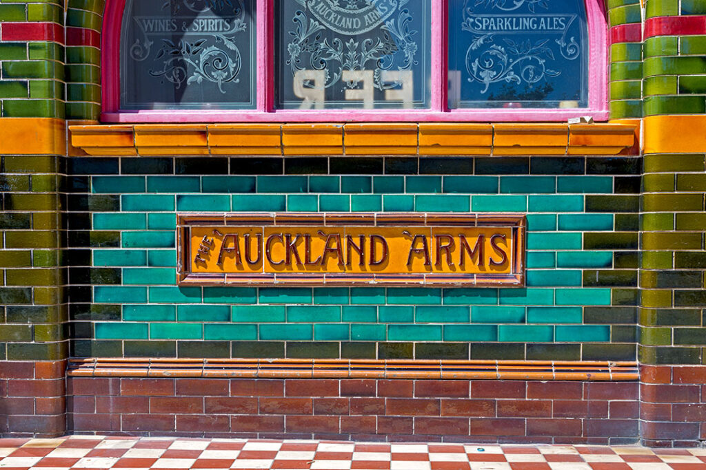 Auckland, Southsea: Close-up of 'Auckland Arms' tiled sign