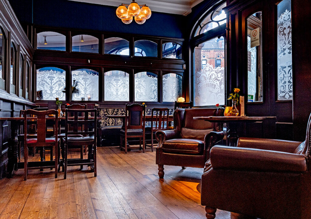 Adelphi, Leeds: Smoke Room with armchairs & wood floor