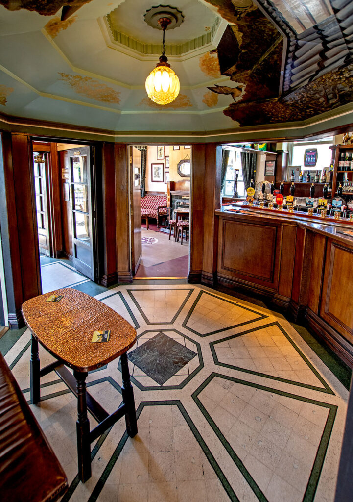 Three Pigeons, Halifax: Octagonal lobby with bar counter to right