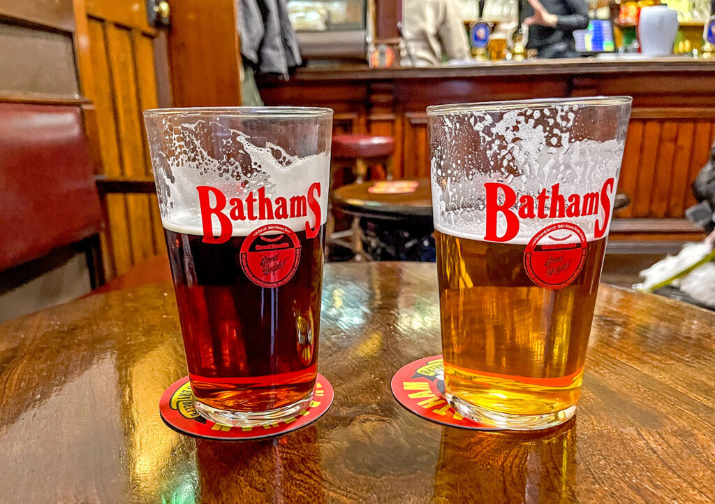 Vine, Brierley Hill: Two pint glasses, one with mild, one with bitter