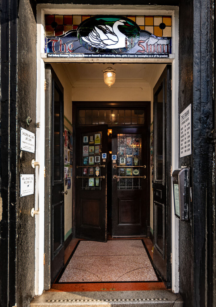 Swan, York: Entrance lobby with mosaic floor and double doors to interior