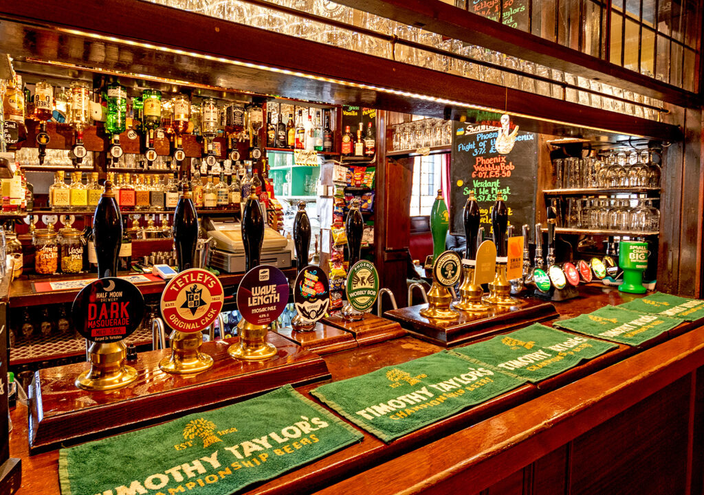 Swan, York: Bar counter with handpumps