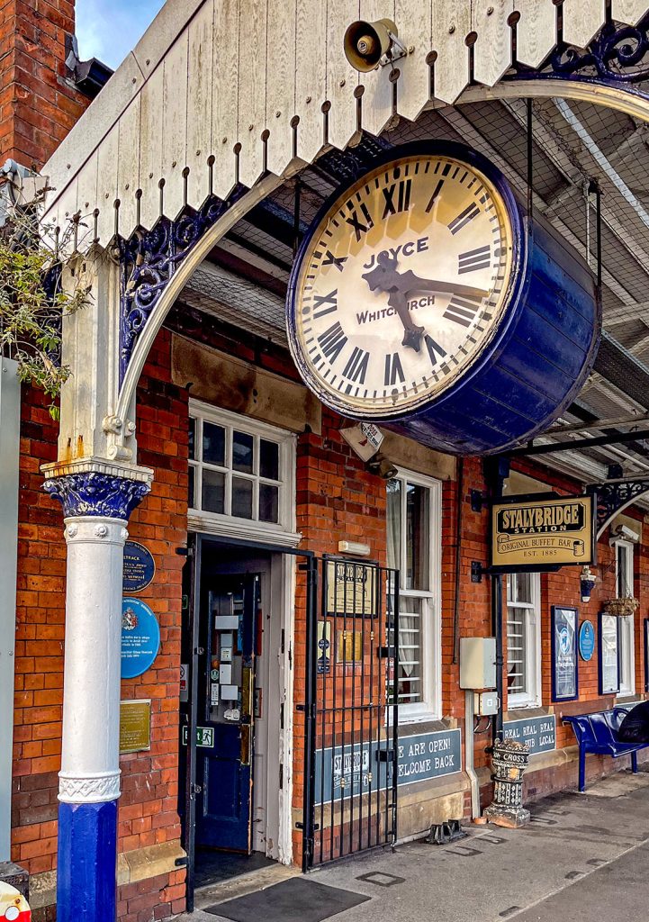 Station Buffet, Stalybridge: Exterior showing platform and station clock.