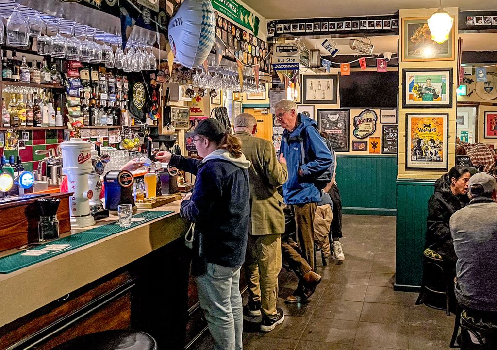 Sunflower, Belfast: Main bar with customers at the counter and seated.