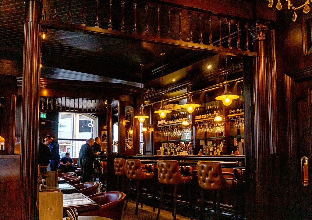 Bankers Cat, Leeds: Mid-right lounge area with seating and tables