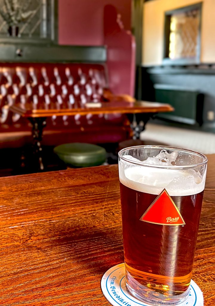 Crown, Stockport: Close-up of pint glass of Bass