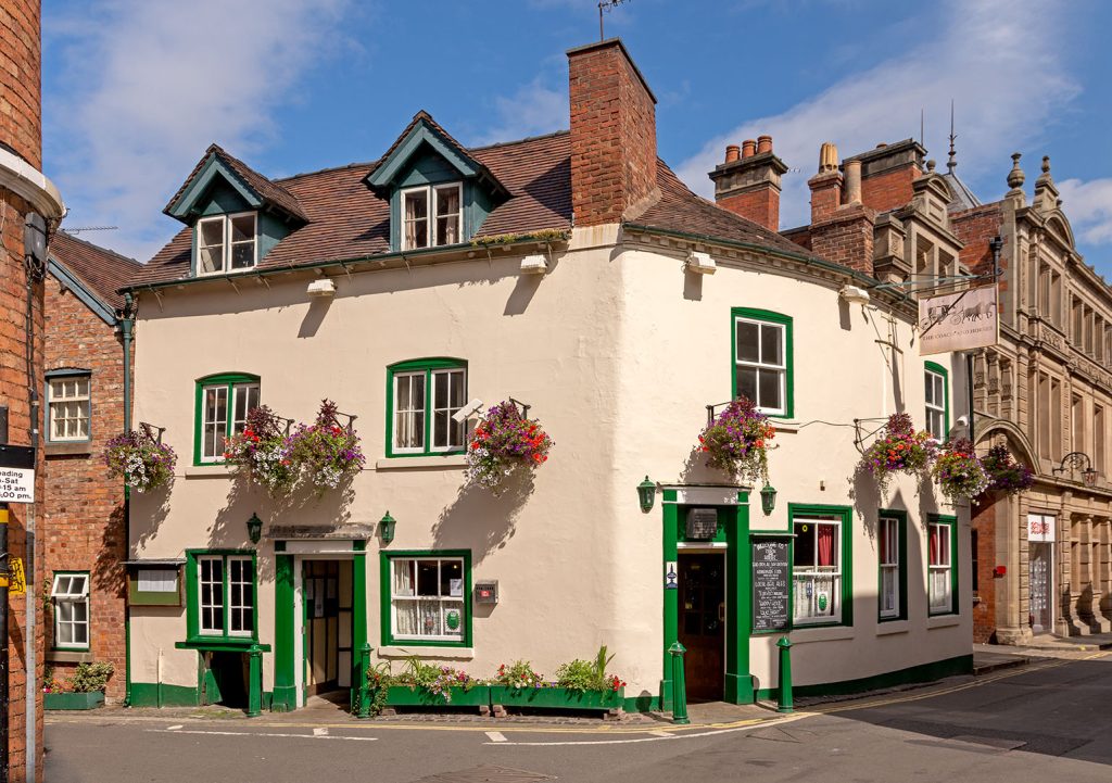 Coach & Horses, Shrewsbury: Exterior (2018), cream walls with green windows and doors
