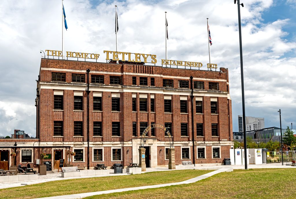 Tetley Pub, Leeds: Red brick 4 storey exterior of old Tetley Brewery offices