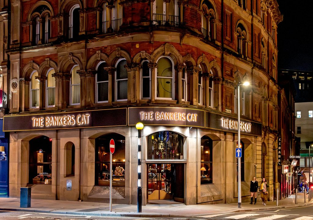 Bankers Cat, Leeds: Exterior at night with illuminated pub name signs.