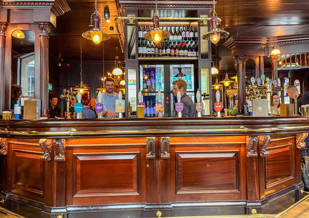 Bankers Cat, Leeds: Bar counter with beer pumps and staff behind.