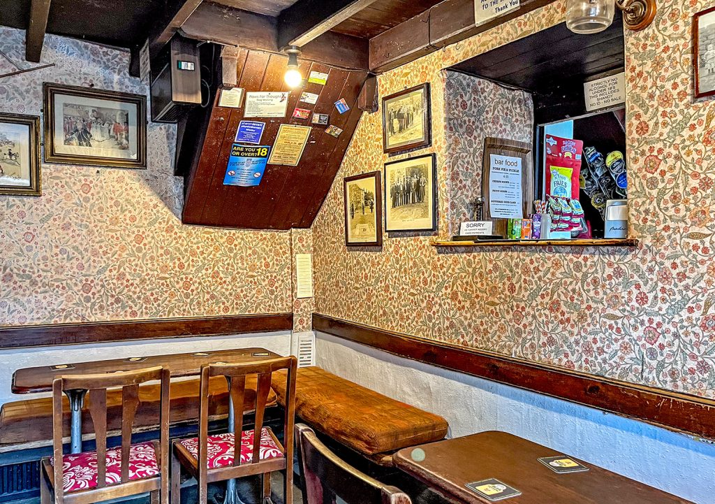 Birch Hall, Beck Hole: The Big Bar showing hatch, bench seating and narrow table